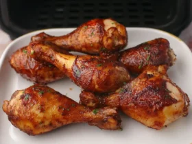 Crispy air fryer BBQ chicken drumsticks glazed with sauce